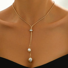 Collar dorado con doble perla – Émora